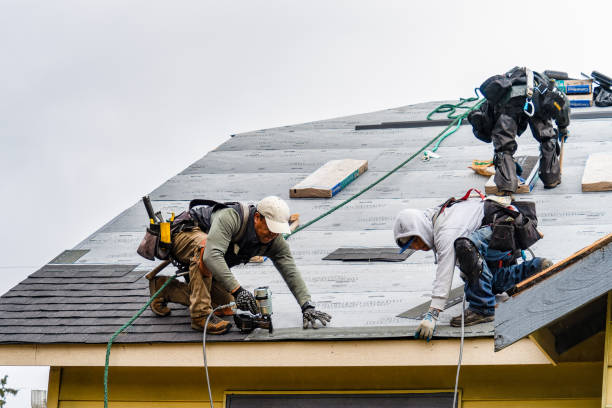 Professional Gutter Installation technician working in Four Lakes, WA